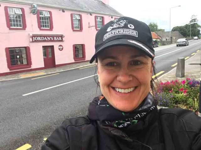 The Happy Canuck, Deanna Deveau, standing in front of Jordan's Bar not far from Galway, Ireland